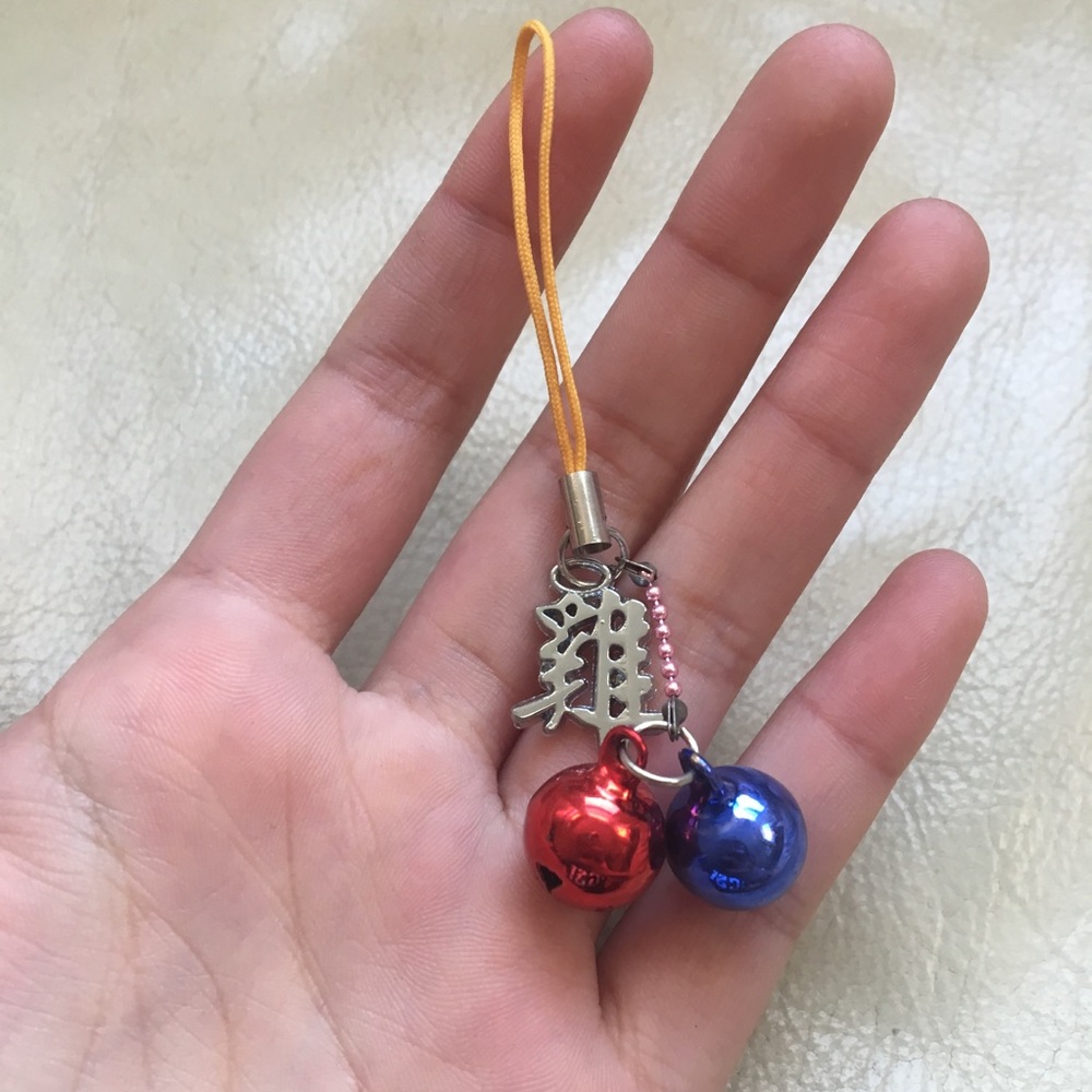 Chinese character charm with bells (jī = chicken)